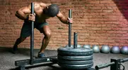 Man-Pushing-Weighted-Sled-Prowler.webp