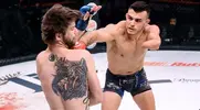 Nick-Newell-Bellator-Punching-MMA-FIght.webp