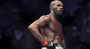 UFC-Jon-Jones-Sitting-On-Fence-After-Fight.webp