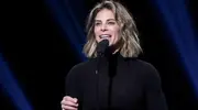 Jillian-Michaels-Giving-Speech-Wearing-Black-Shirt.webp