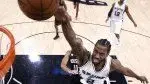 NBA-Player-Kawhi-Leonard-Dunking-A-Basketball.webp