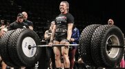 Strongwoman Erin Murray performing a 600lb llift at a strongman competition