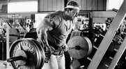 Dorian Yates workout with barbell shrugs