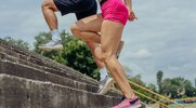 Fit couple running the 15 minute outdoors stair workout