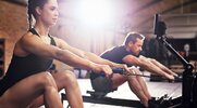 Guy-Girl-Rowing-Machine-Side-By-Side