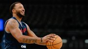 Norman Powell preparing to shoot a basketball during warm up