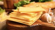 Processed cheese slices on a cutting board