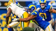 NFL LA Rams Quentin Lake tackling a green bay packer