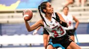 American Flag Football player Diana Flores throwing a football