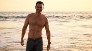 Actor Luke Cook's muscular chest after taking a swim at the beach