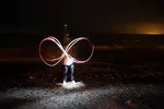 infinity-sign-light-show-with-fireworks-1024x683.webp