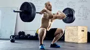 Skinny-Man-Performing-A-Front-Squat.webp