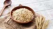 Rolled-Oats-Cereal-In-A-Wooden-Bowl.webp