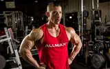 allmax-athlete-with-shoulder-pump.webp