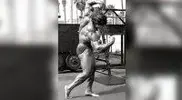 Franco-Columbu-demonstrating-a-twisting-back-pose.webp