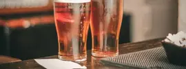 depth-of-field-photo-of-two-pilsner-glasses-681847.webp