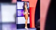 -her-butt-during-a-female-bodybuilding-competition.webp