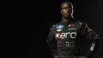 ar-driver-Jessie-Iwuji-wearing-his-racing-uniform-.webp