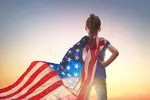 patriotic-holiday-happy-kid-cute-little-child-girl-american-flag-usa-celebrate-th-july-92761597.webp