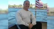 dybuilder-and-police-officer-Joe-Palumbo-on-a-boat.webp