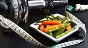 ed-vegetables-next-to-dumbbells-and-measuring-tape.webp