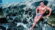 Samir-Bannout-sitting-on-the-ocean-cliff.webp