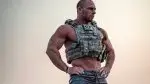 Matt-Cable-wearing-a-bulletproof-vest-outdoors.webp