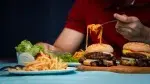 Man-Eating-Pasta-Burgers-French-Fries.webp