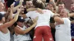 2022-NoBull-Crossfit-winners-hugging-the-crowd.webp