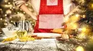 male-In-Apron-Cooking-Baking-Christmas-Themed-Meal.webp