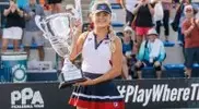 pion-Anna-Leigh-Waters-holding-a-pickleball-trophy.webp