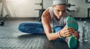 stretching-with-headphone-841195948.webp