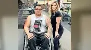 ns-posing-with-an-adaptive-athlete-in-a-wheelchair.webp