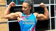 Mila Stanzani flexing her biceps