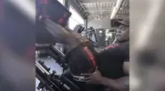 Bodybuilder and Former Mr. Olympia Brandon Curry working out his quads with an ankle injury with a leg press exercise