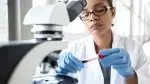 Female doctor analyzing a blood sample for prp therapy injection and metaformin