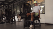 Tommy Wall using a leg machine at technogym