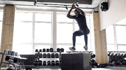 Fit and agile male performing box jumps for his plyometric training program