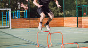 -performing-hurdle-hops-for-his-plyometric-workout.jpg