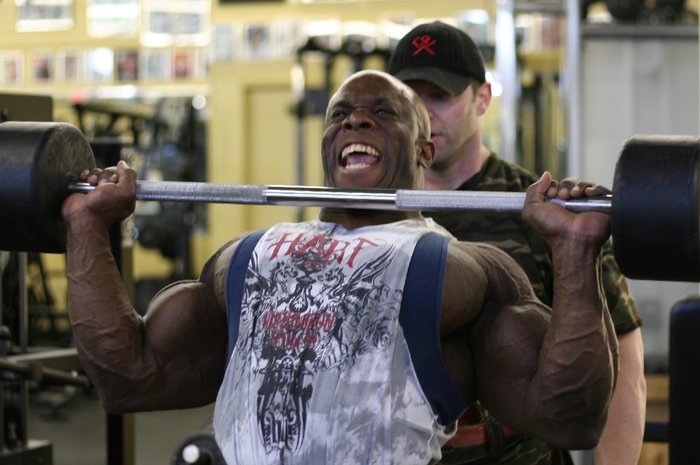 [IFFB pro] Kevin English pushes his way through a dropset of seated barbell military presses.